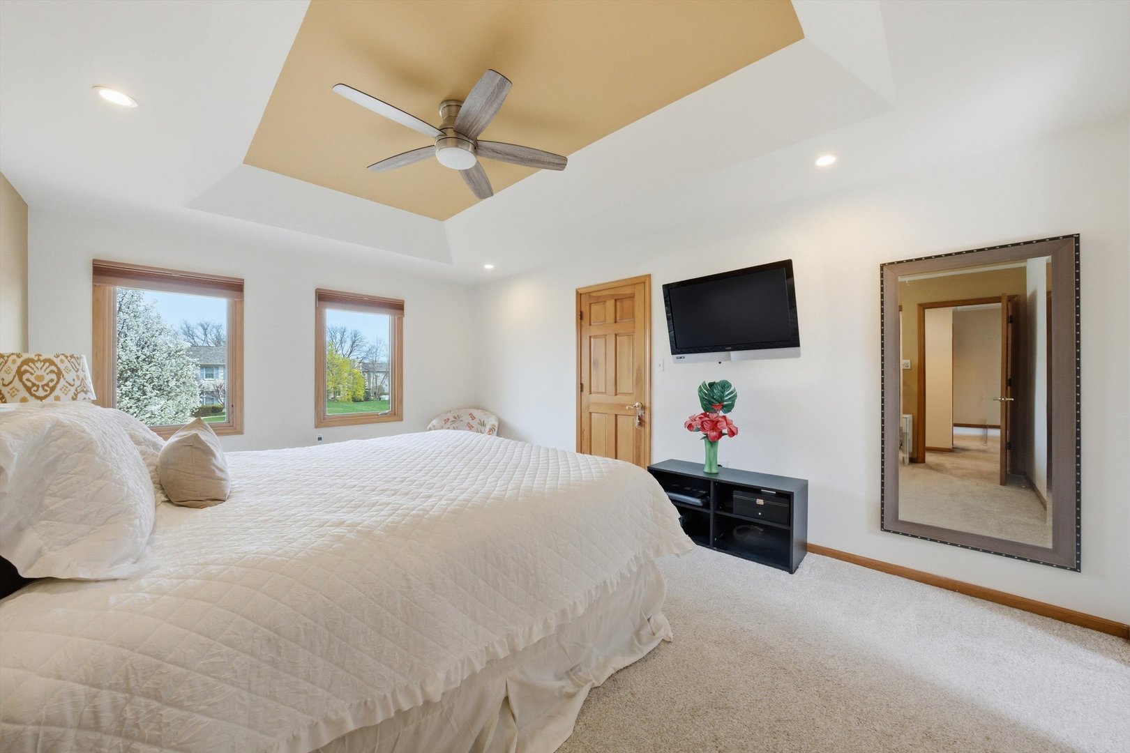 18 Newgate Avenue Naperville, IL 60565 - Photo 15 of 29 a bedroom with a bed and a flat screen tv