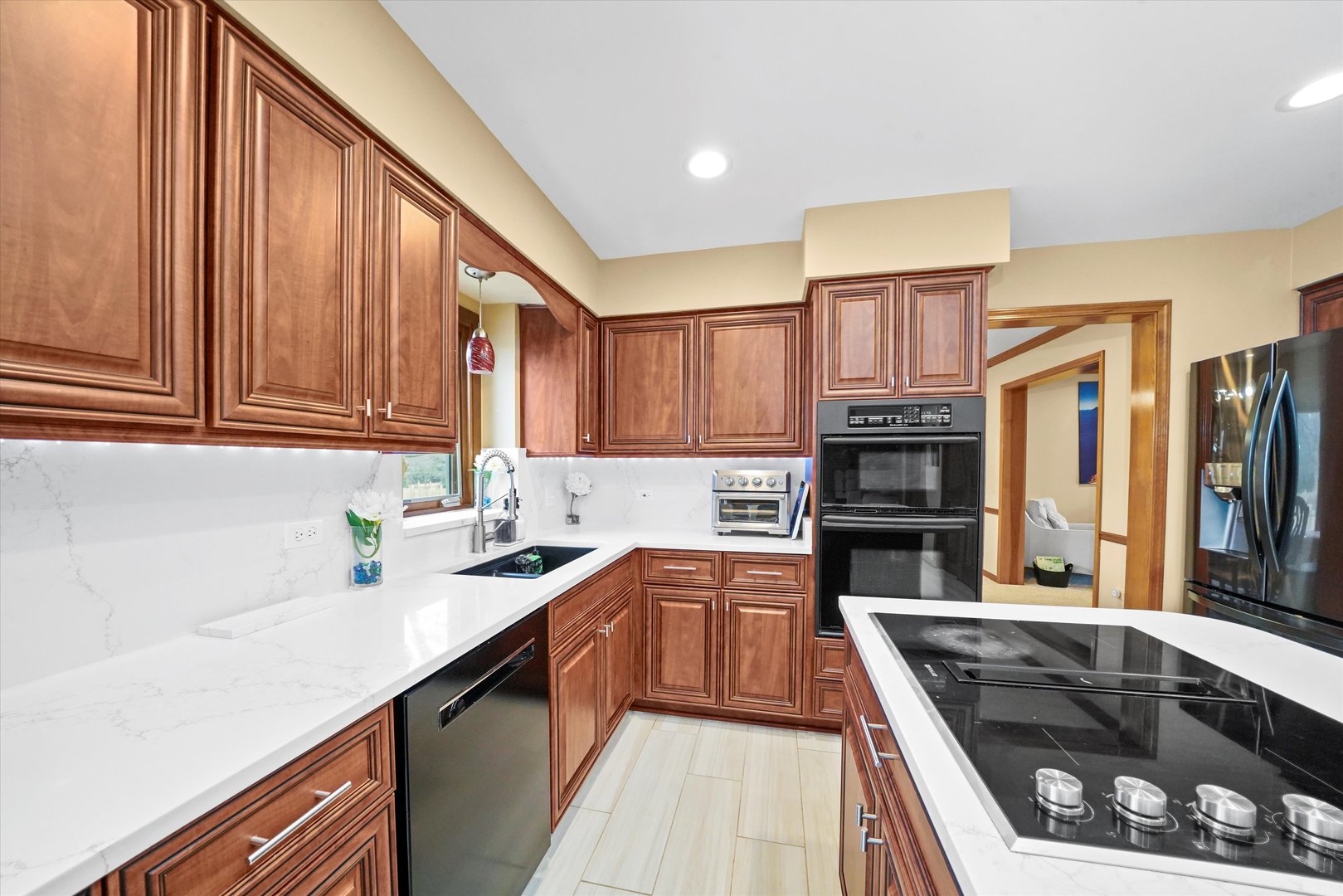 18 Newgate Avenue Naperville, IL 60565 - Photo 8 of 29 a kitchen with stainless steel appliances a sink stove and cabinets