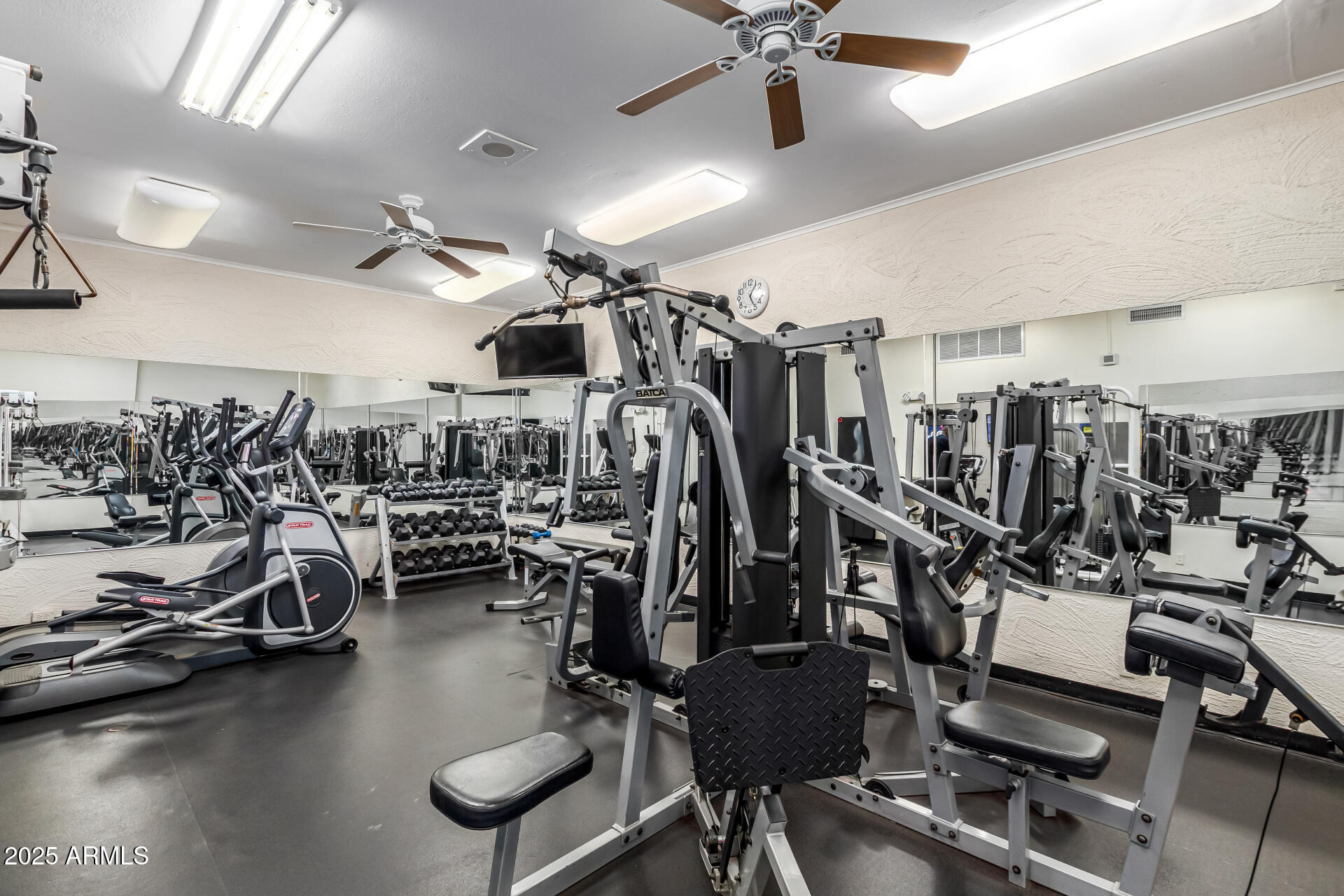 7910 East Camelback Road, Unit 203 Scottsdale, AZ 85251 - Photo 11 of 12 a view of a room with gym equipment