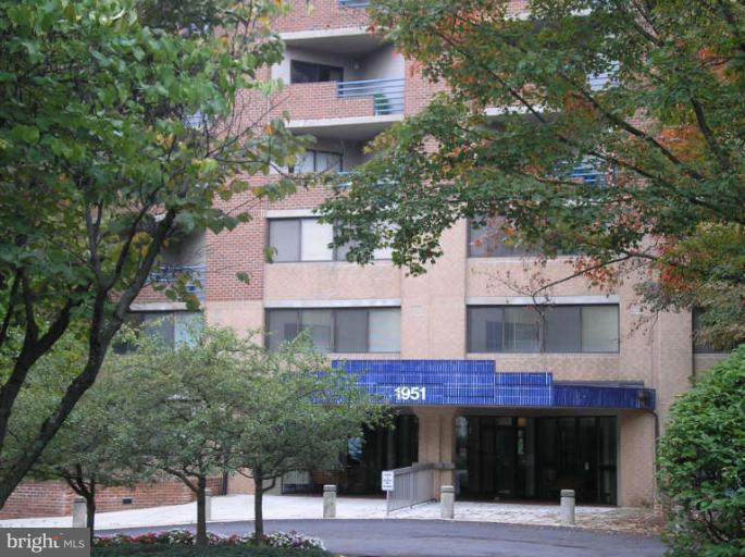 1951 Sagewood Lane, Unit 421 Reston, VA 20191 - Photo 1 of 22 Covered main entrance with secure entry