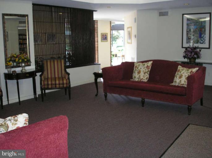 1951 Sagewood Lane, Unit 421 Reston, VA 20191 - Photo 12 of 22 Welcoming main lobby