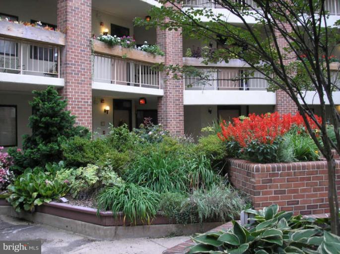 1951 Sagewood Lane, Unit 421 Reston, VA 20191 - Photo 18 of 22 Meet your new friends & neighbors in the courtyard