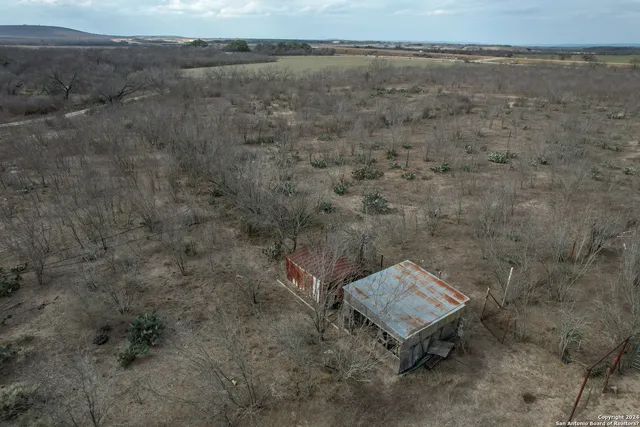 a view of a yard with an outdoor space