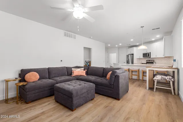 a kitchen with a sink a stove and refrigerator