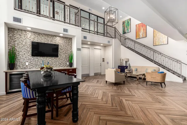 a kitchen with a table and chairs in it