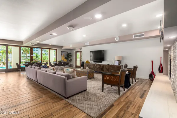 a living room with furniture and a window