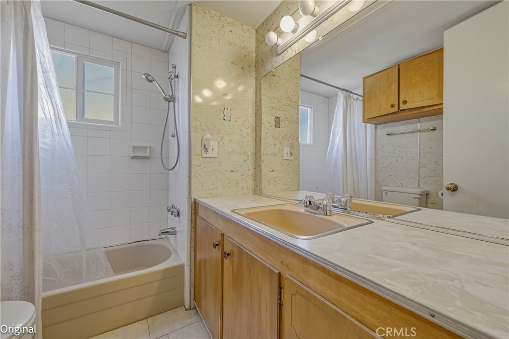 9810 Boat Club Snelling, CA 95369 - Photo 27 of 51 a bathroom with a granite countertop tub sink and mirror
