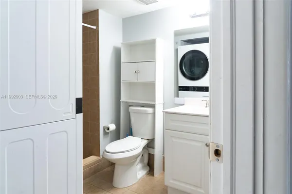 a bathroom with a toilet and a sink