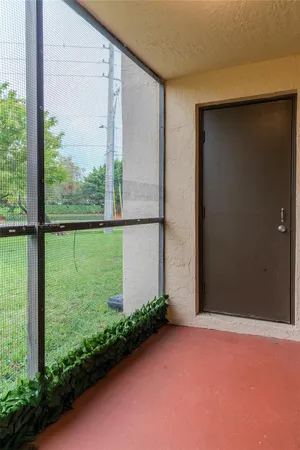 a view of a backyard of the house