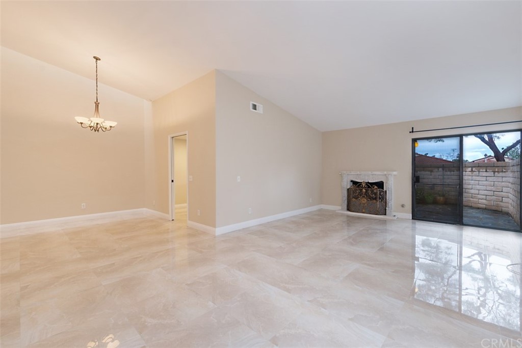 25666 Seaside Drive, Unit 134 Dana Point, CA 92629 - Photo 2 of 13 a view of an empty room with a window