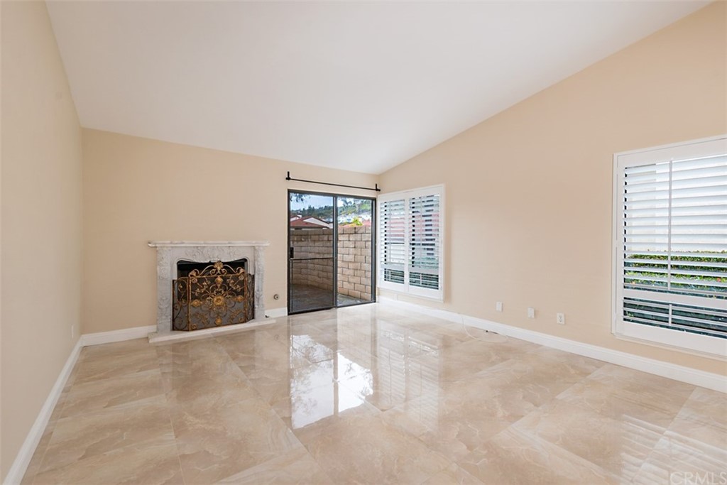 25666 Seaside Drive, Unit 134 Dana Point, CA 92629 - Photo 3 of 13 a view of an empty room with a window
