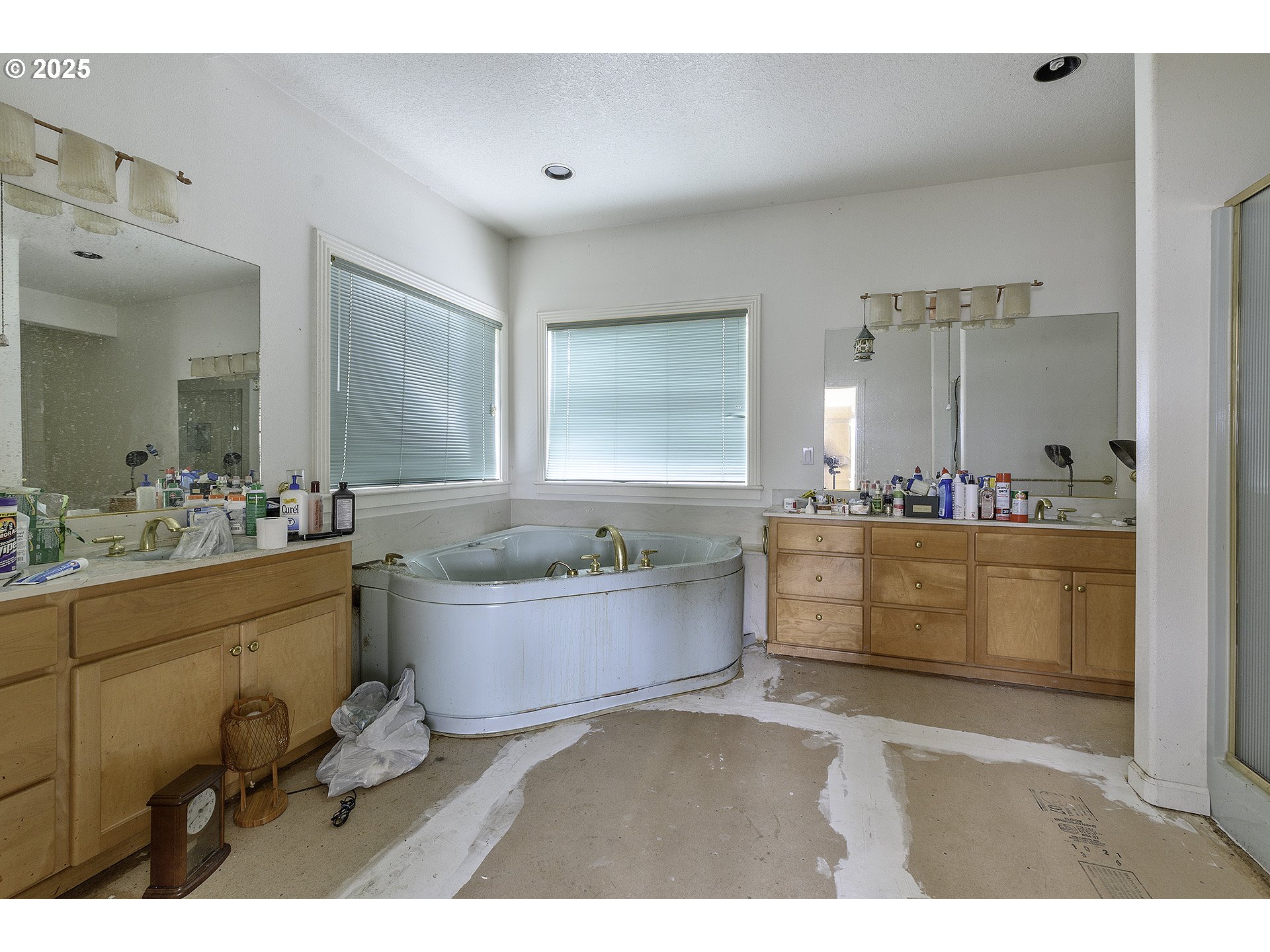 16333 Southwest Timberland Drive Beaverton, OR 97007 - Photo 12 of 42 a bathroom with a granite countertop sink mirror bathtub and toilet