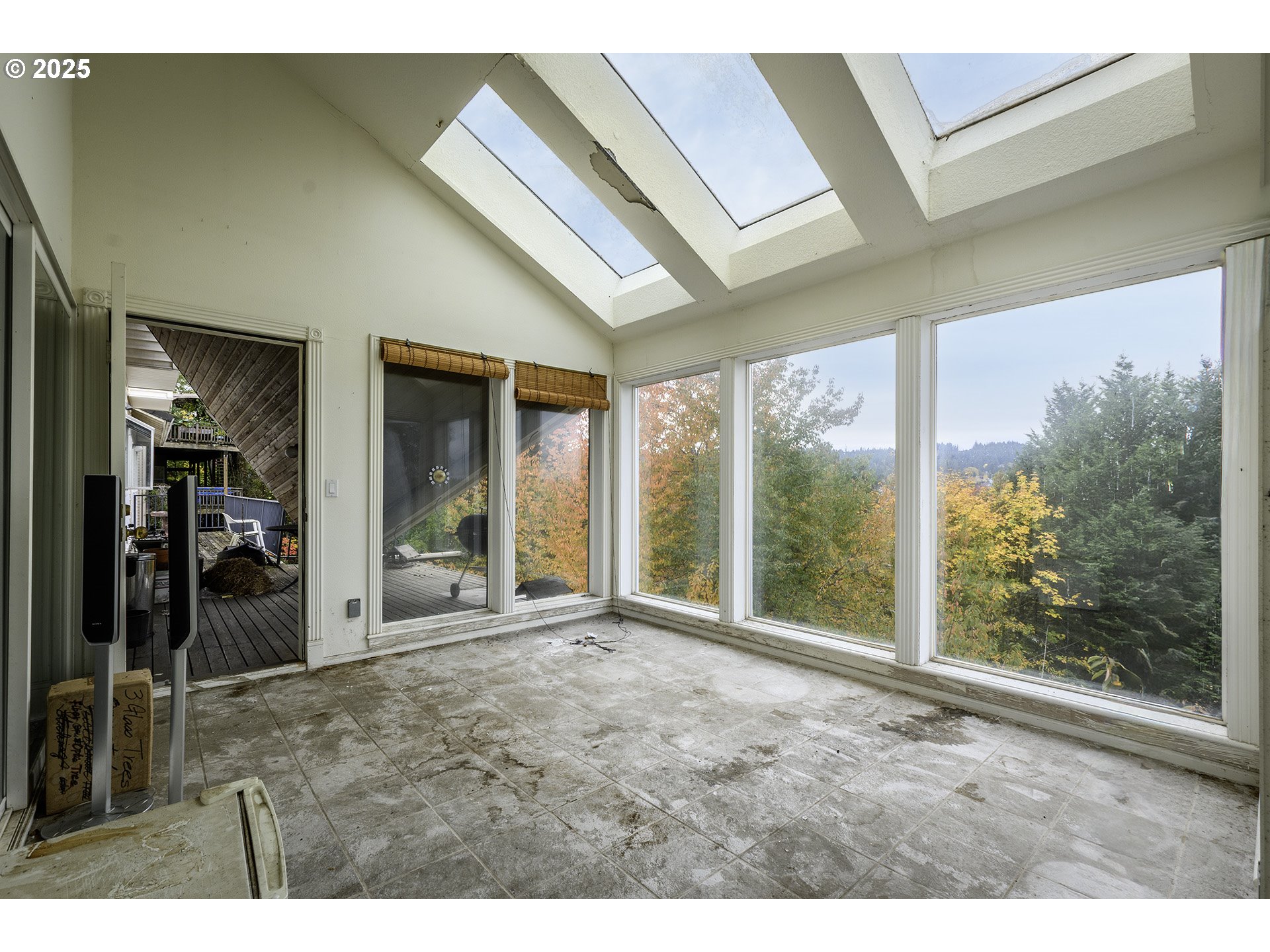 16333 Southwest Timberland Drive Beaverton, OR 97007 - Photo 14 of 42 a big room with wooden floor and windows