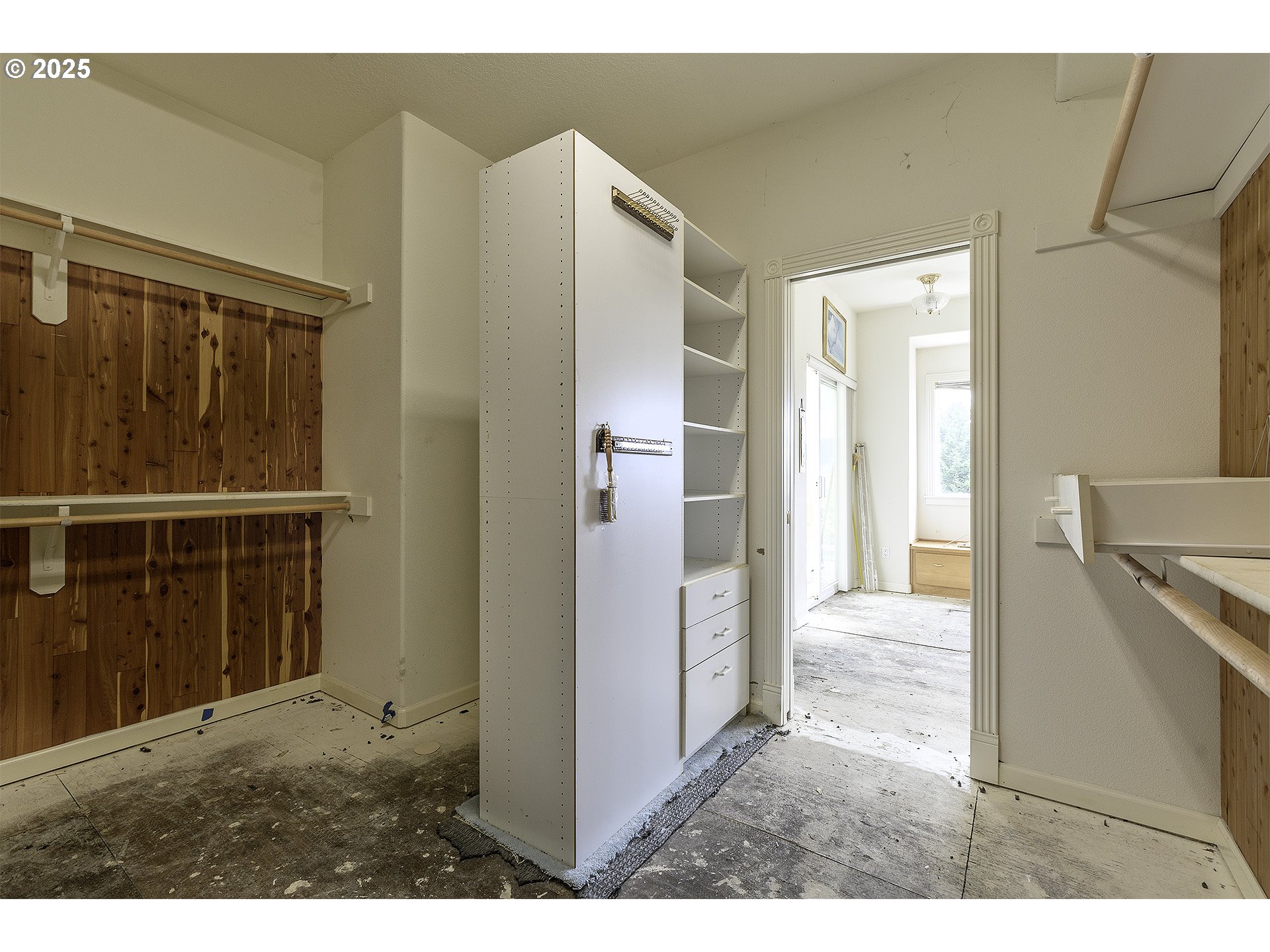 16333 Southwest Timberland Drive Beaverton, OR 97007 - Photo 18 of 42 a view of a hallway with wooden floor and a living room