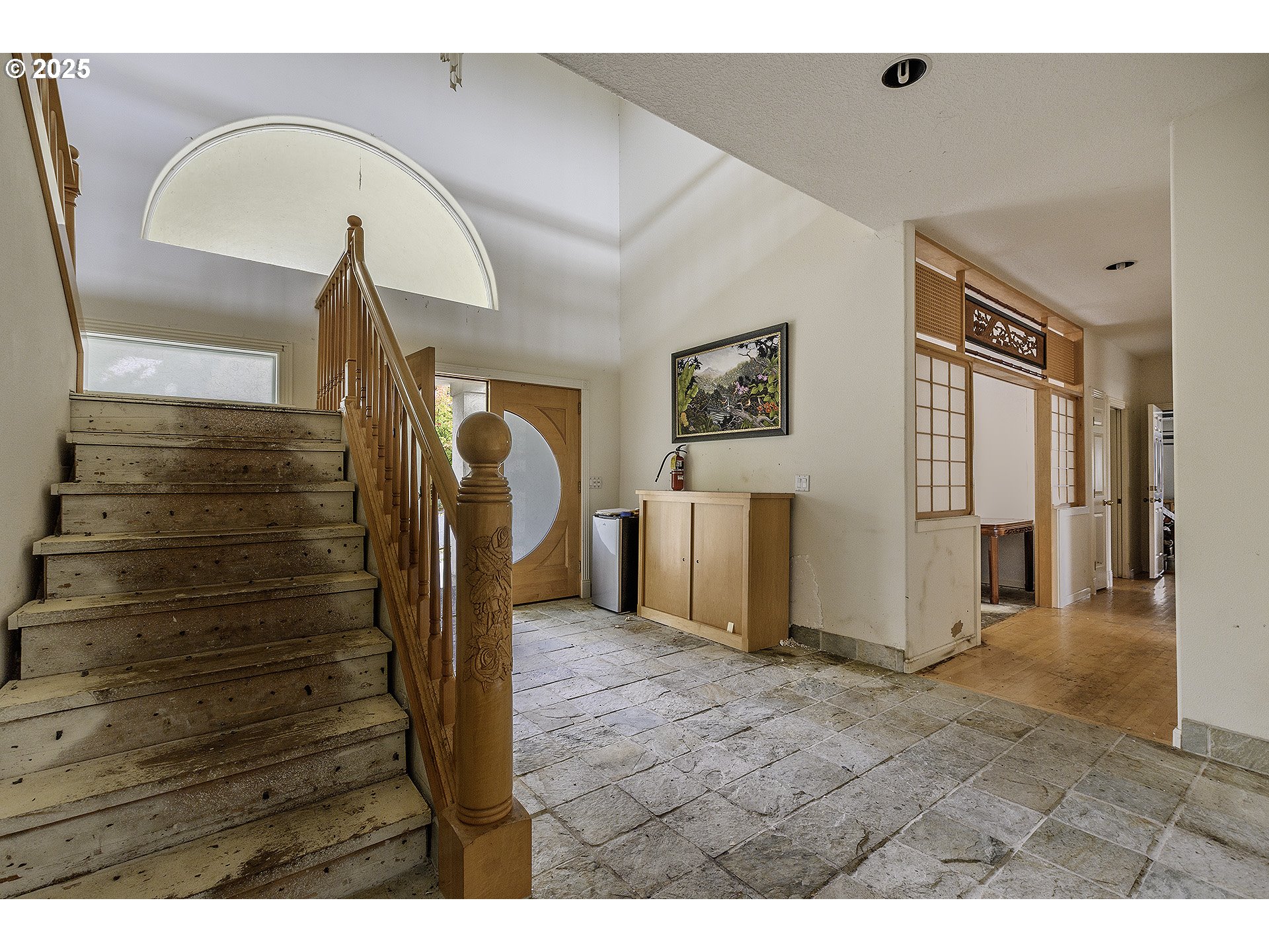 16333 Southwest Timberland Drive Beaverton, OR 97007 - Photo 3 of 42 a view of a hallway with wooden floor
