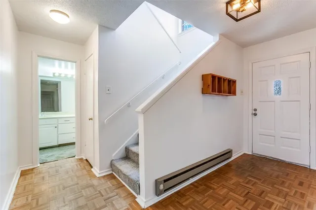 a view of an entryway with stairs