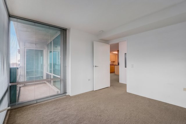 800 Elgin Road, Unit 1220 Evanston, IL 60201 - Photo 17 of 39 a view of an empty room and glass door