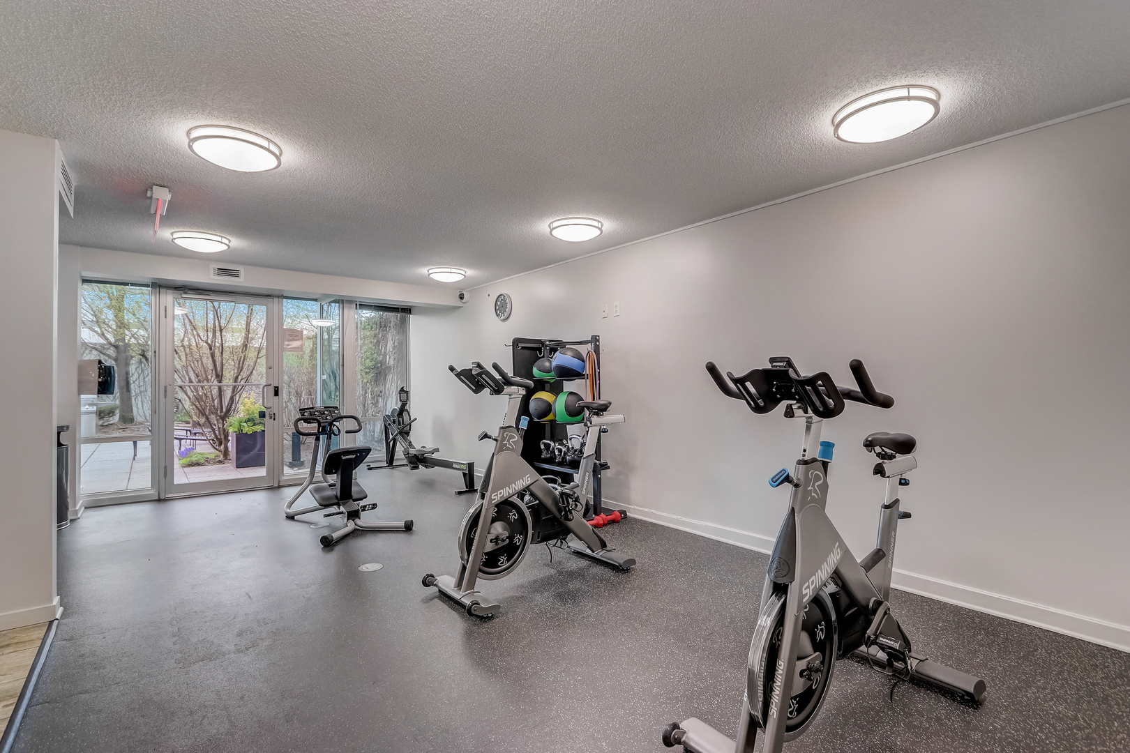 800 Elgin Road, Unit 1220 Evanston, IL 60201 - Photo 25 of 39 a view of a room with gym equipment