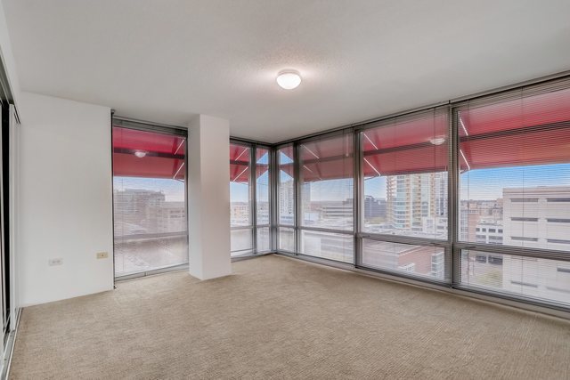 800 Elgin Road, Unit 1220 Evanston, IL 60201 - Photo 7 of 39 wooden floor and windows in a room