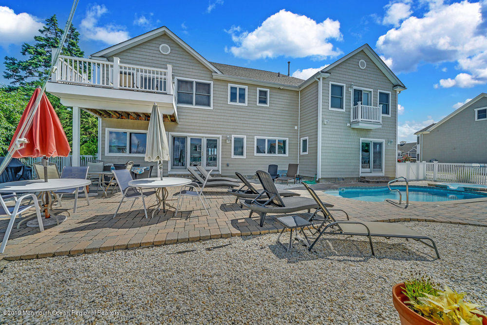 195 Ketch Road Mantoloking, NJ 08738 - Photo 44 of 44 a view of a house with backyard and sitting area