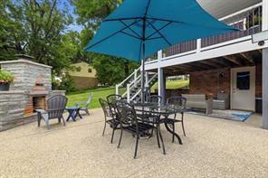 283 Brookwood Road Venetia, PA 15367 - Photo 32 of 36 an outdoor space with furniture and umbrella