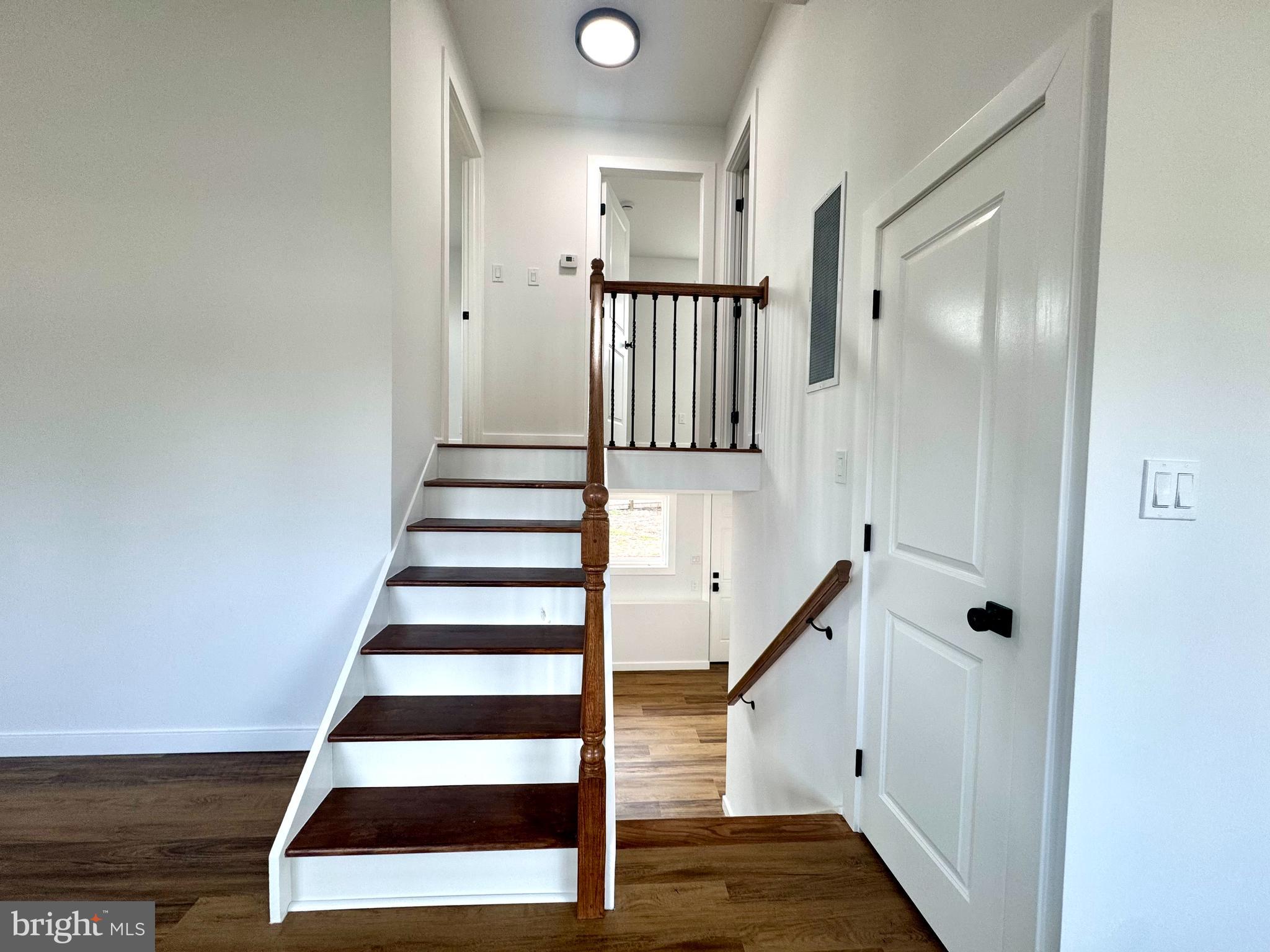 63 Gerard Road Hamilton, NJ 08620 - Photo 13 of 22 a view of entryway with wooden floor and white walls