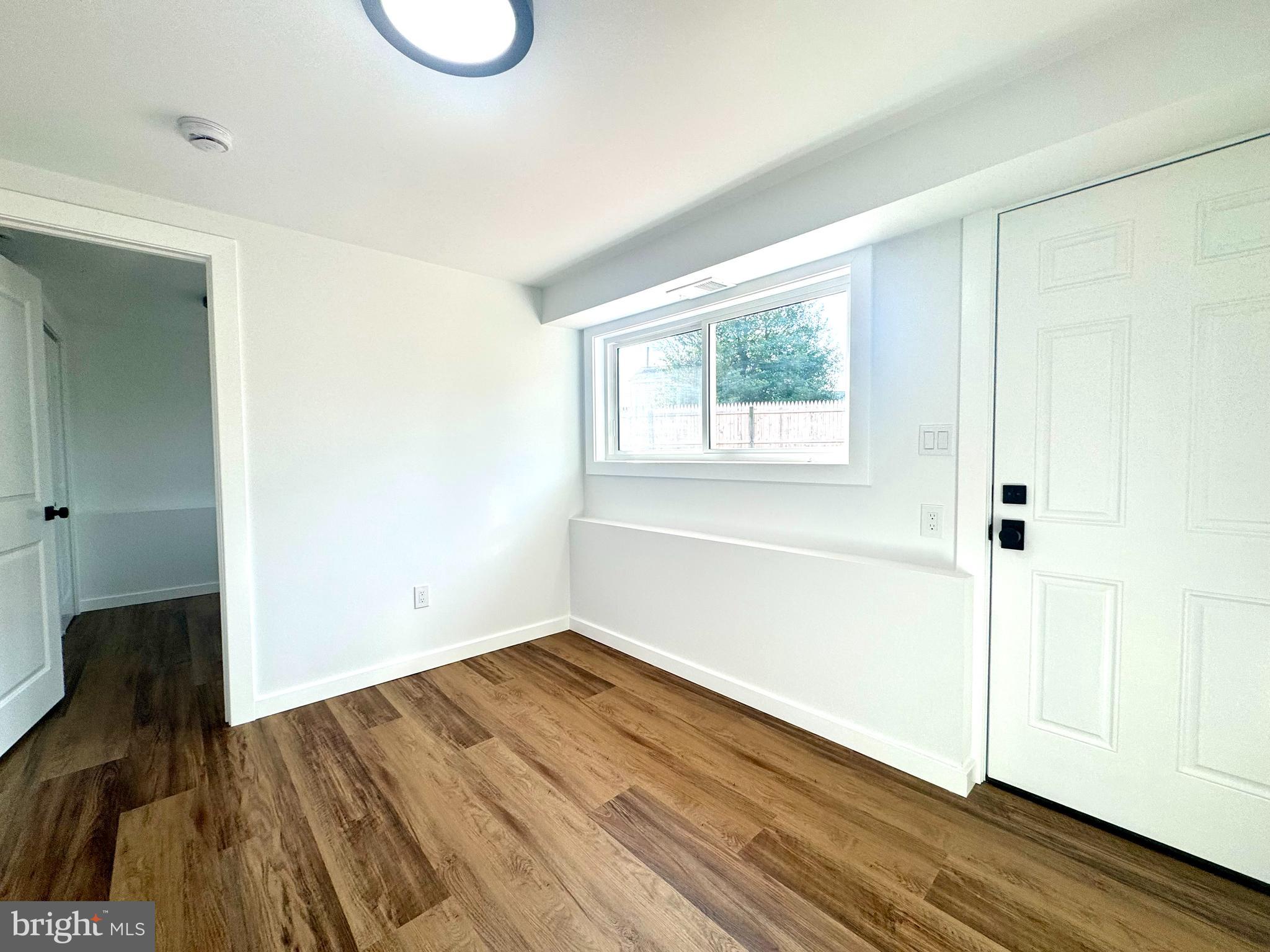 63 Gerard Road Hamilton, NJ 08620 - Photo 15 of 22 a view of a room with wooden floor and white walls