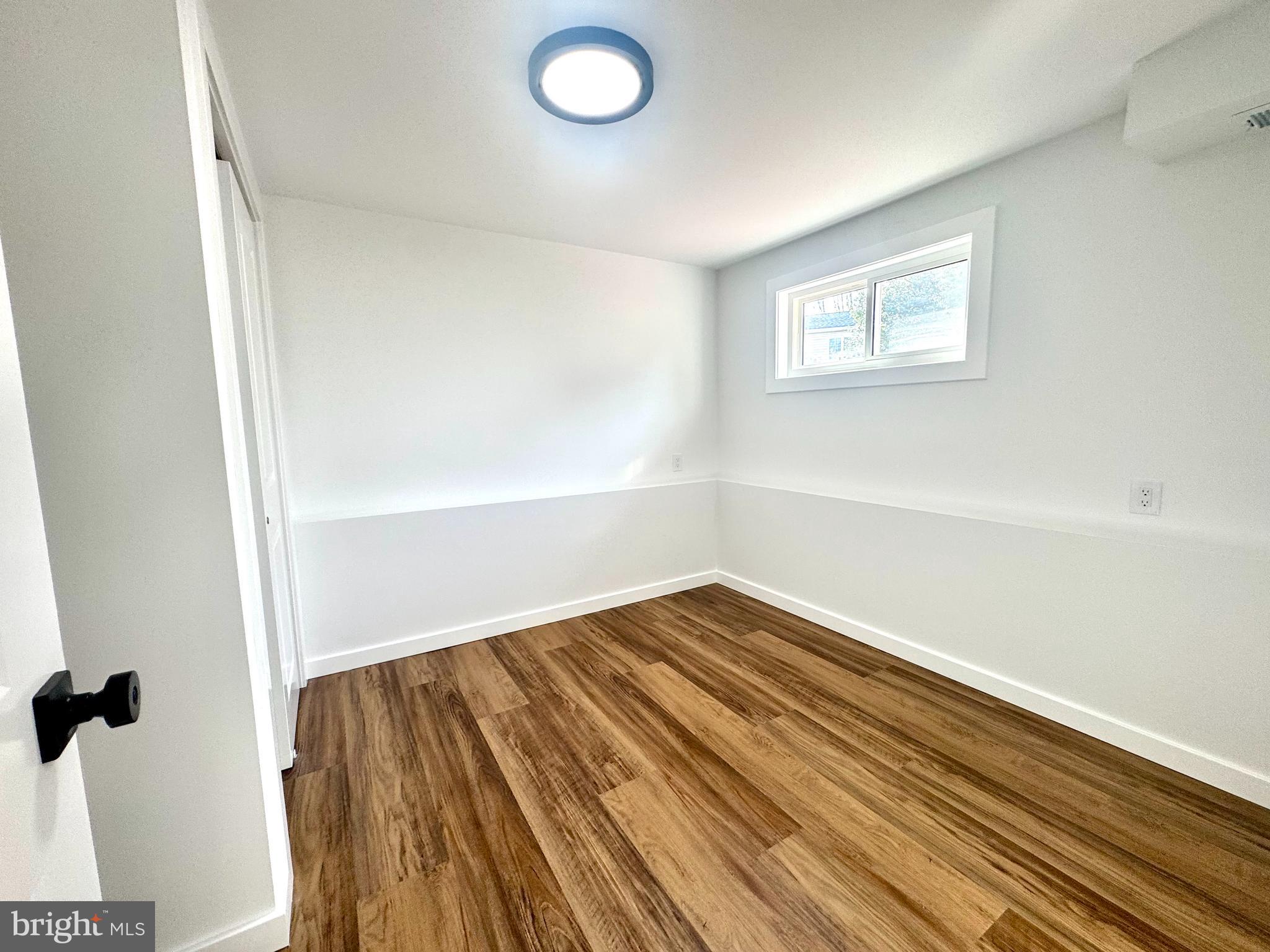 63 Gerard Road Hamilton, NJ 08620 - Photo 16 of 22 a view of a room with wooden floor