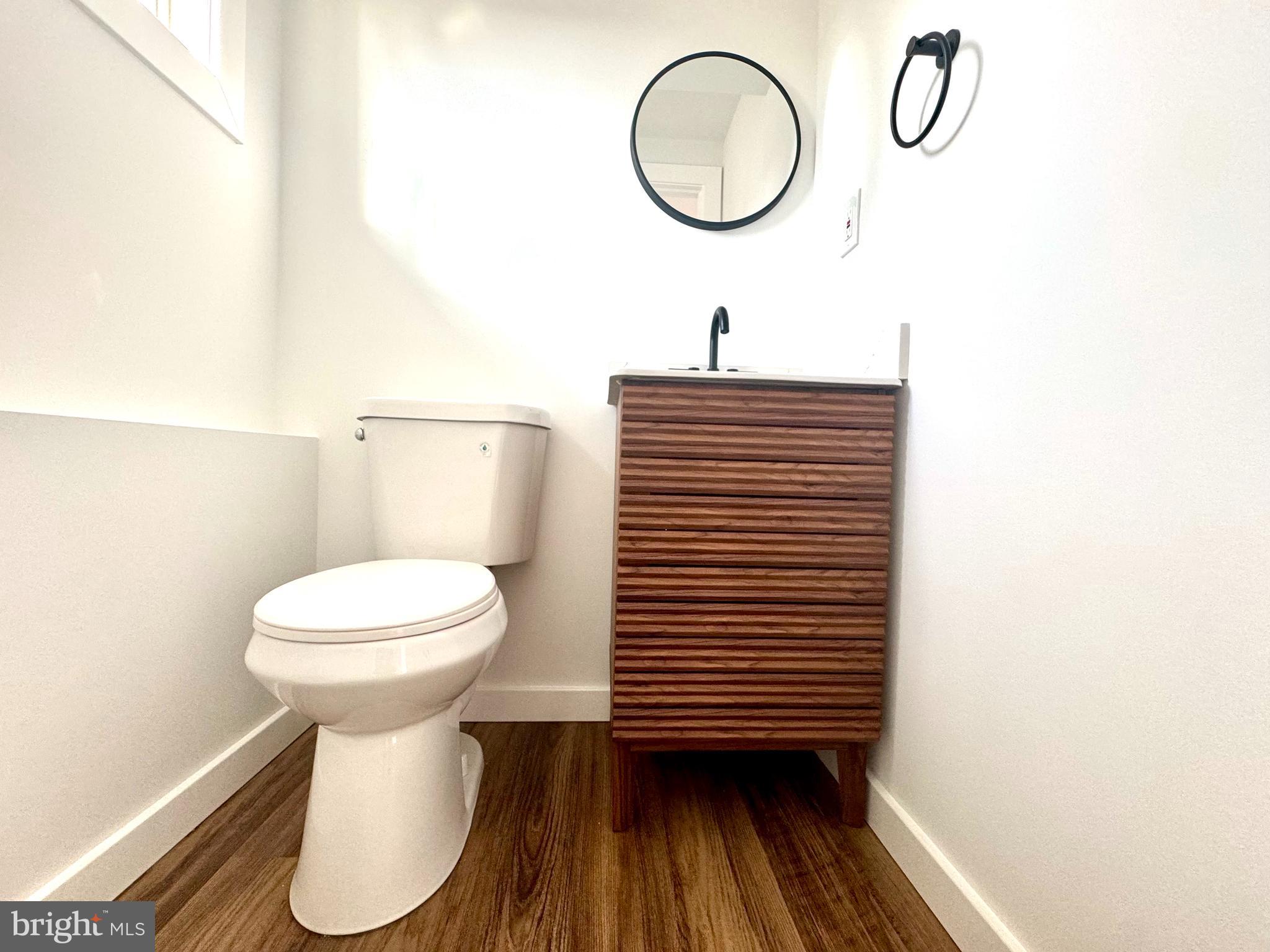 63 Gerard Road Hamilton, NJ 08620 - Photo 17 of 22 a bathroom with a toilet and a mirror
