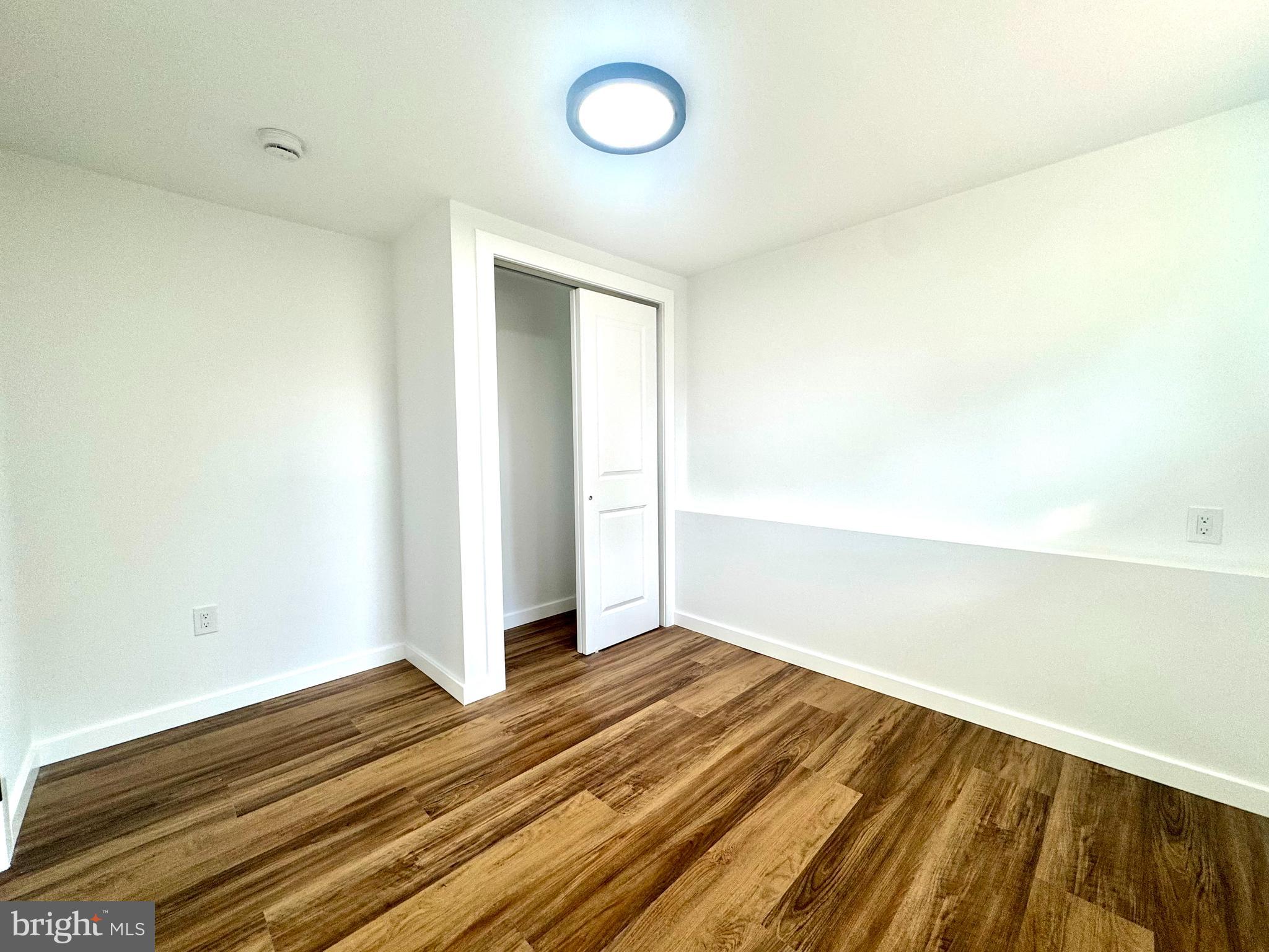 63 Gerard Road Hamilton, NJ 08620 - Photo 18 of 22 a view of a room with wooden floor and white walls