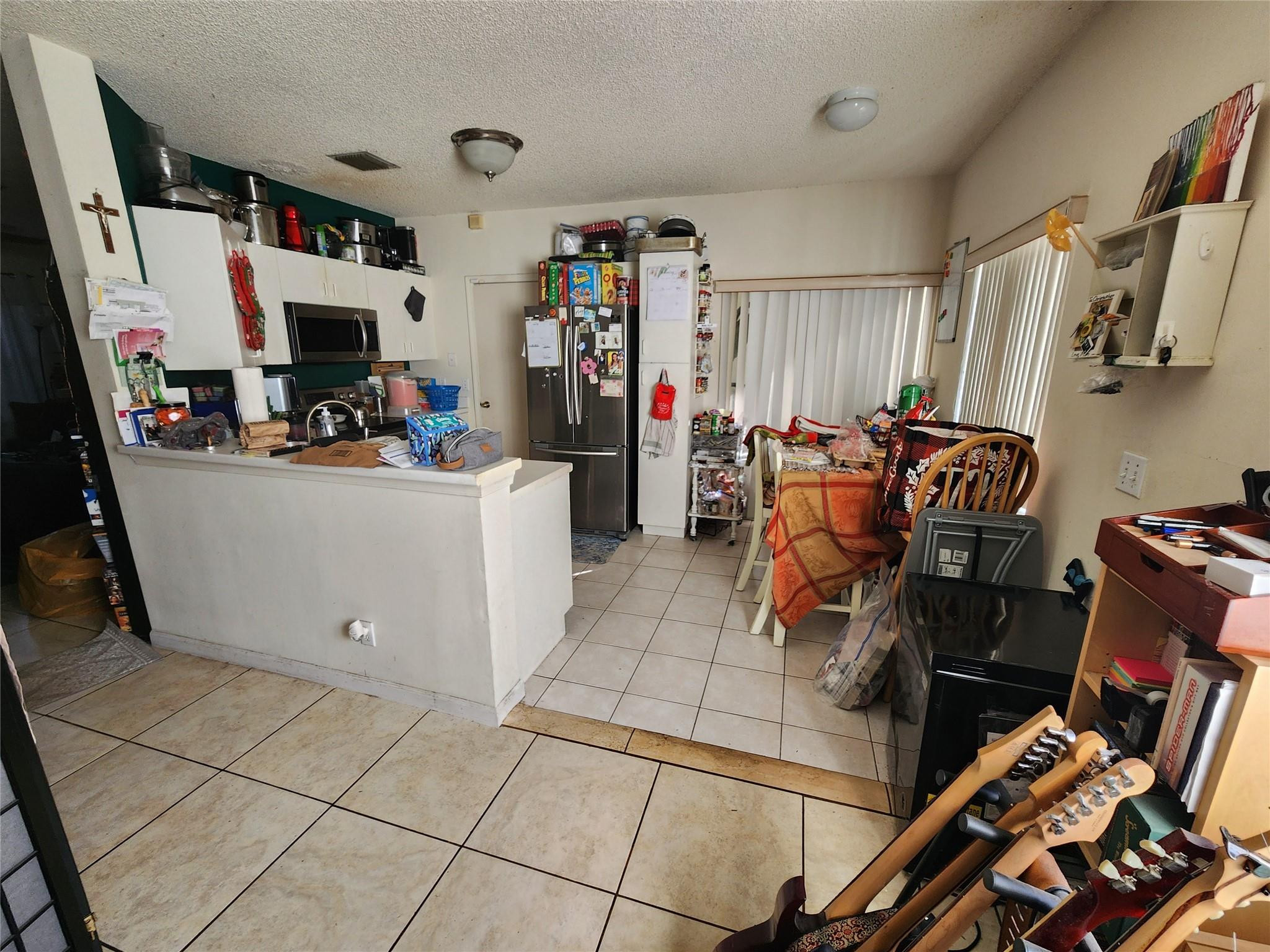 9470 Stanley Lane Tamarac, FL 33321 - Photo 5 of 8 Kitchen