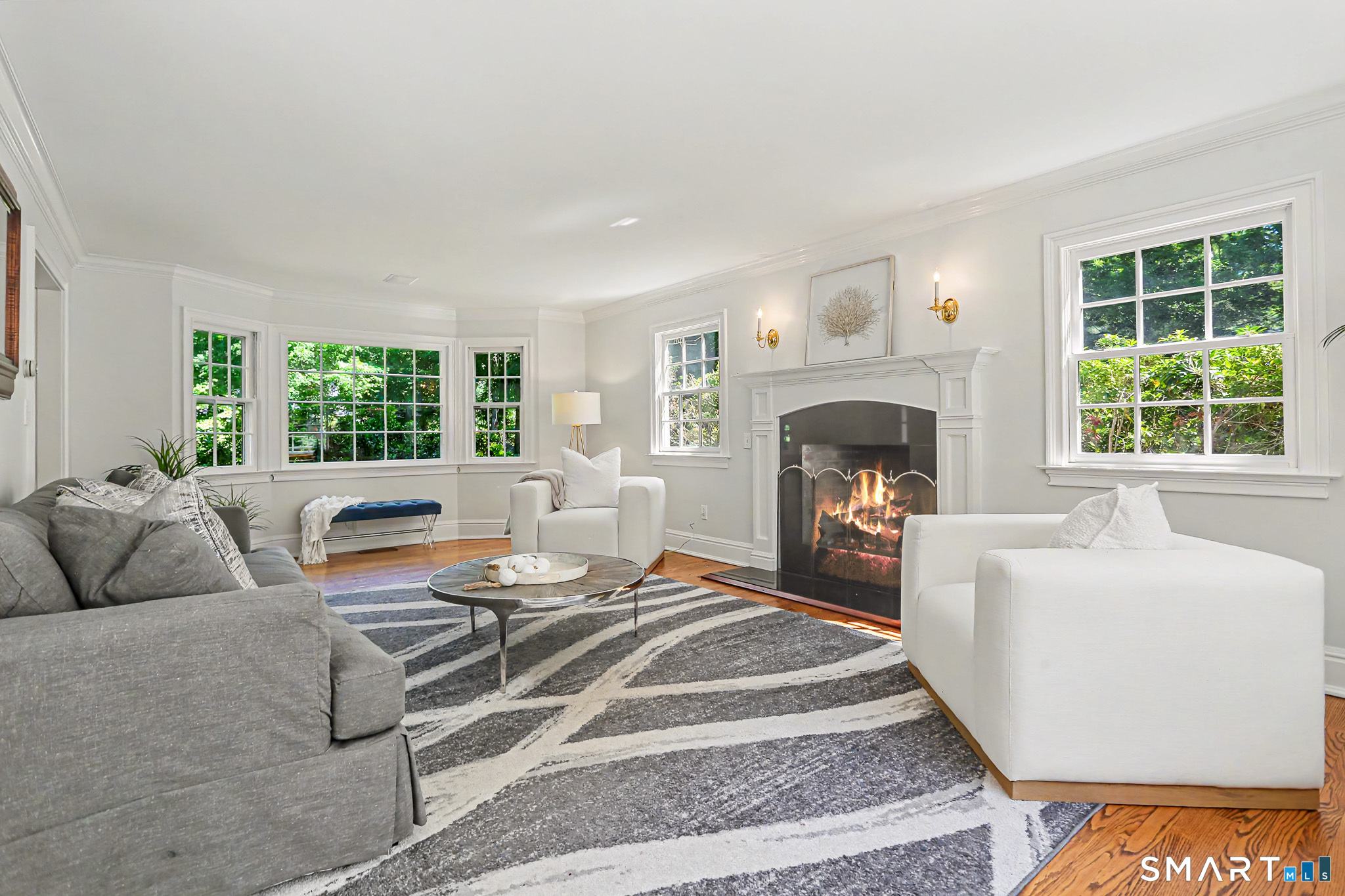 6 Adams Way Weston, CT 06883 - Photo 6 of 40 Another view of the living room looking toward the bay window.