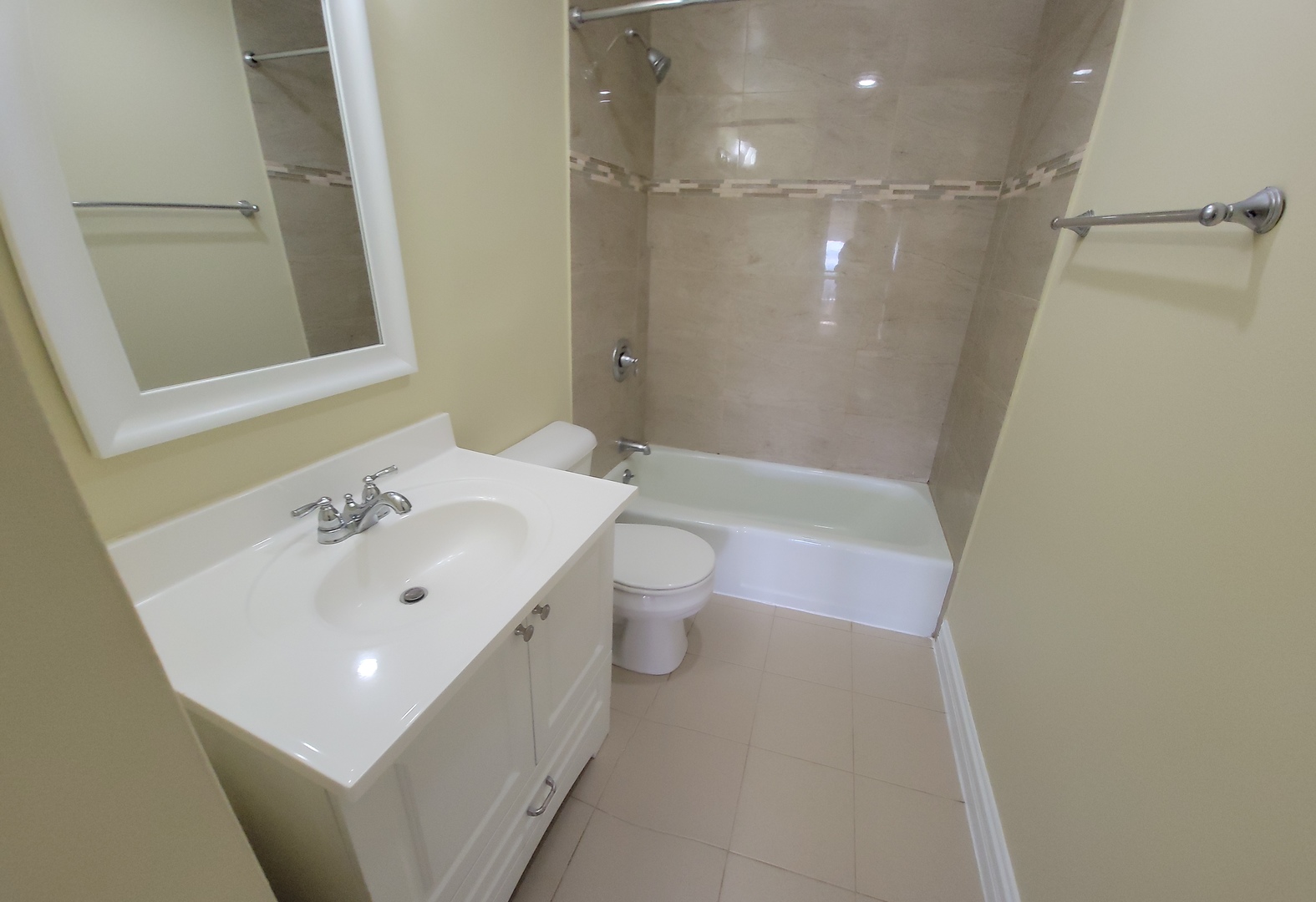5415 North Sheridan Road, Unit 4414 Chicago, IL 60640 - Photo 12 of 23 a bathroom with a sink a toilet and shower
