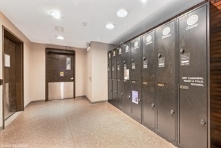 5415 North Sheridan Road, Unit 4414 Chicago, IL 60640 - Photo 20 of 23 a view of hallway with a bathroom