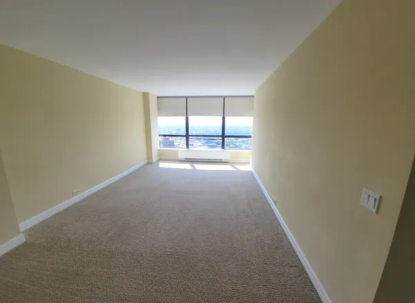 an empty room with windows