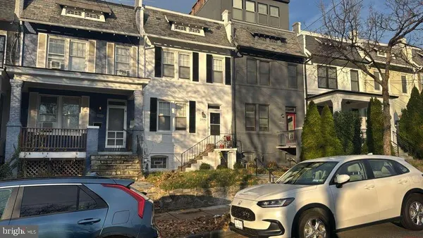 a view of a car park in front of a building