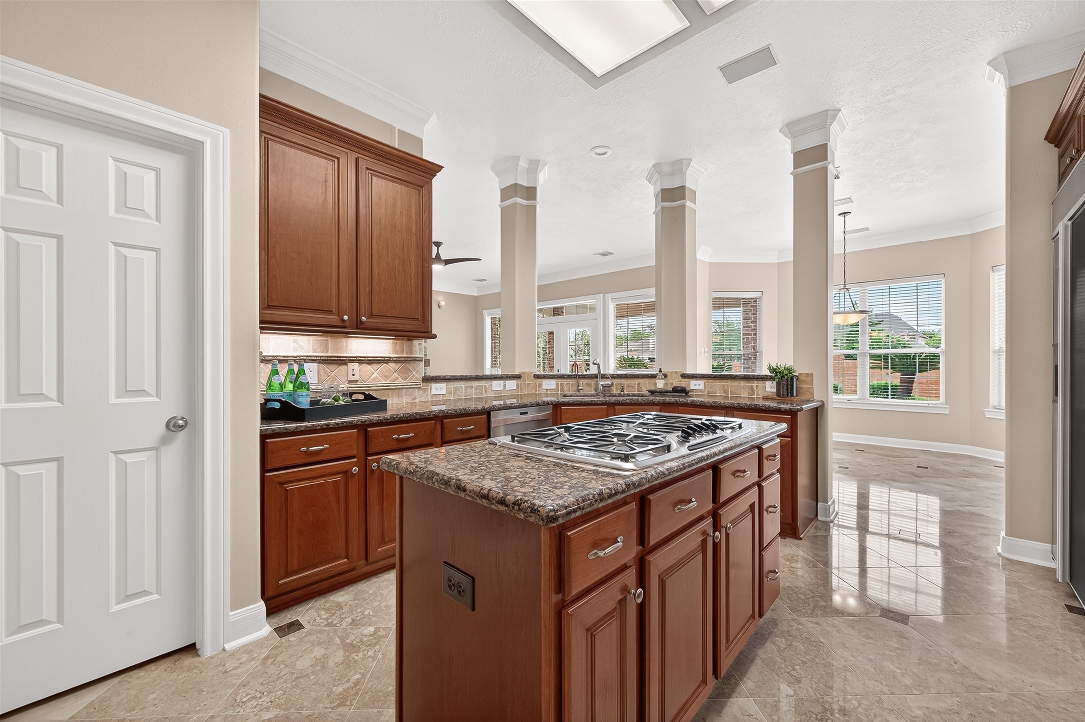 4203 Deforest Ridge Circle Katy, TX 77494 - Photo 18 of 50 Undercabinet lighting is a plus and the huge walk-in pantry has tons of stoarge as a portion of it is under the second staircase