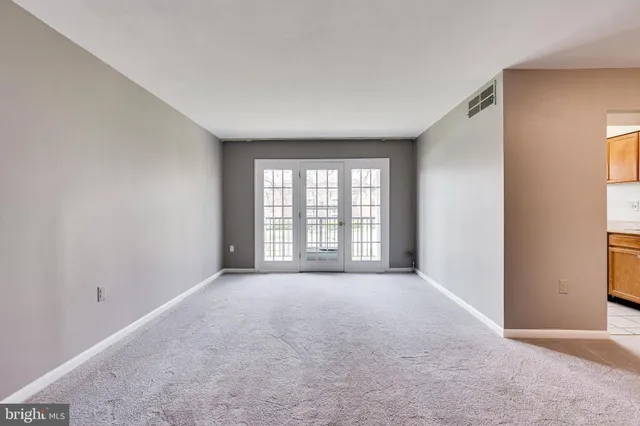 a kitchen with stainless steel appliances granite countertop a sink and a stove top oven