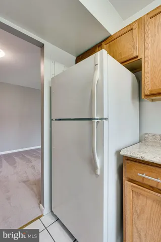 a bathroom with a sink mirror toilet and bathtub