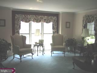 3 Burdock Close Road Newark, DE 19711 - Photo 3 of 6 a living room with furniture and a large window