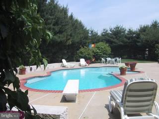 3 Burdock Close Road Newark, DE 19711 - Photo 5 of 6 a view of a swimming pool with a patio