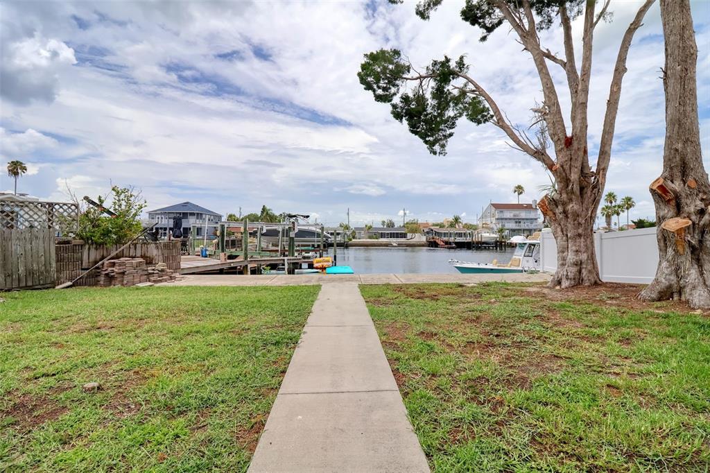 13637 Lagoon Drive Hudson, FL 34667 - Photo 31 of 36 a view of a lake with houses