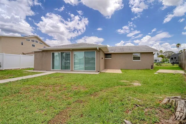 an aerial view of a houses with outdoor space