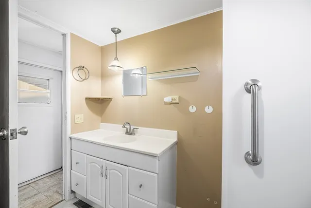 a balcony with view of the house