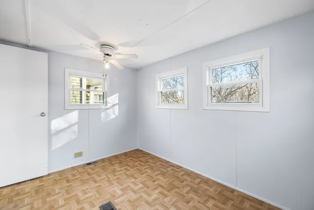 a view of a house with a large window