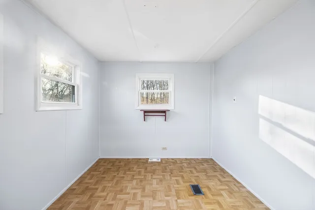 a view of a yard with a tree