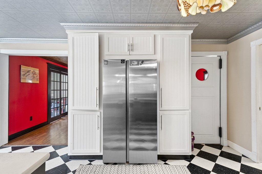 13 Coombs Street Southbridge, MA 01550 - Photo 14 of 41 a view of kitchen with refrigerator and window