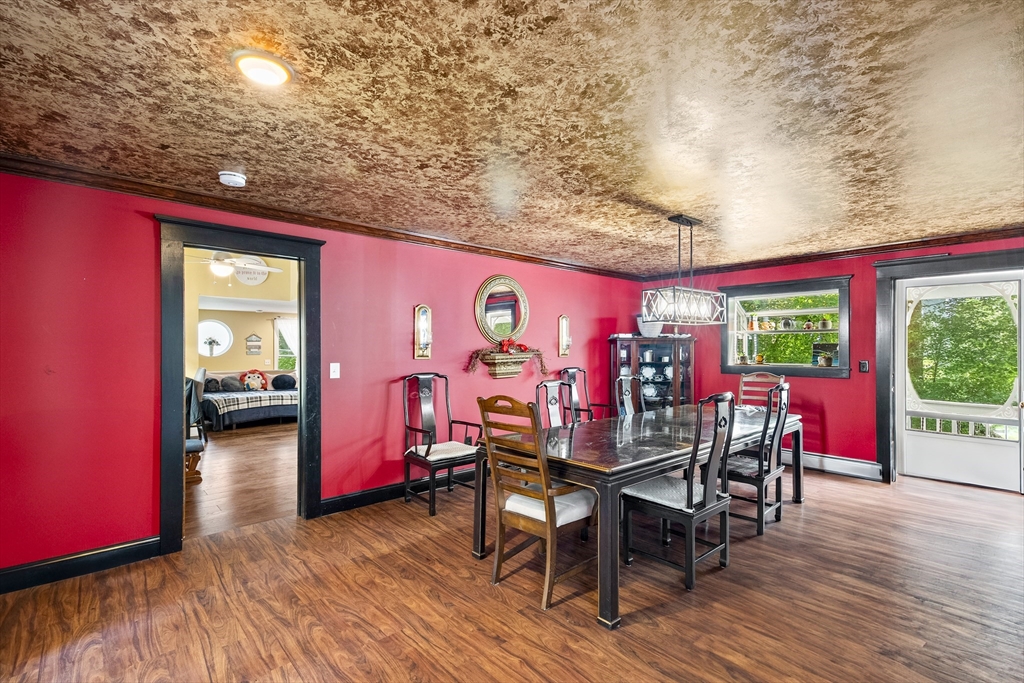 13 Coombs Street Southbridge, MA 01550 - Photo 15 of 41 a view of a dining room with furniture window and wooden floor