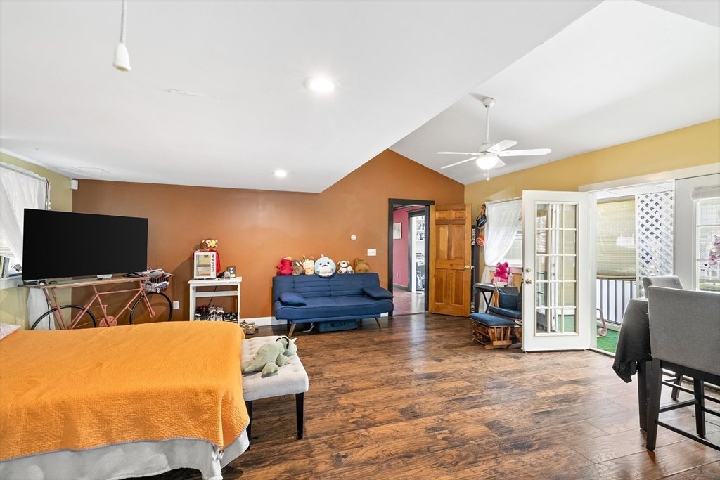 13 Coombs Street Southbridge, MA 01550 - Photo 18 of 41 a living room with furniture and a flat screen tv