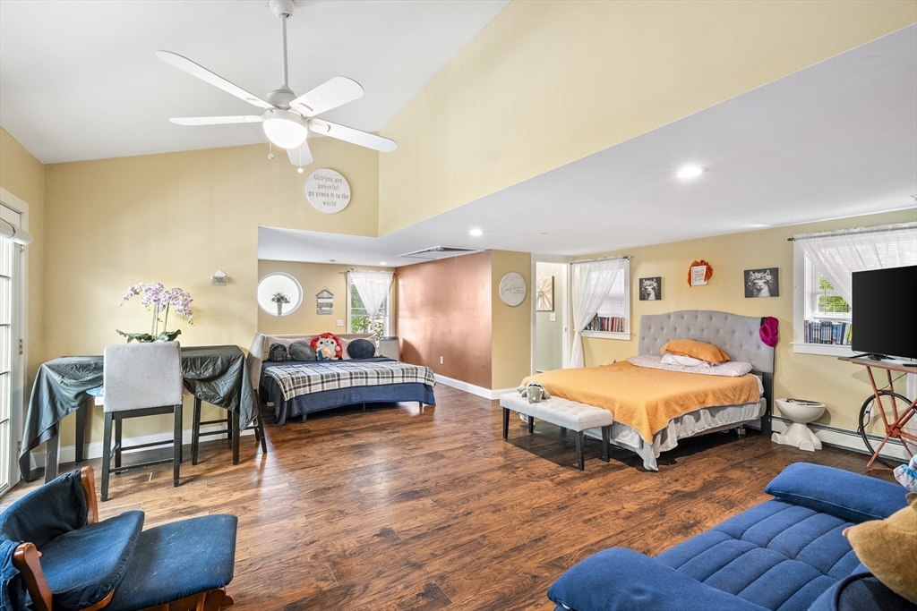 13 Coombs Street Southbridge, MA 01550 - Photo 20 of 41 a bedroom with furniture and a flat screen tv